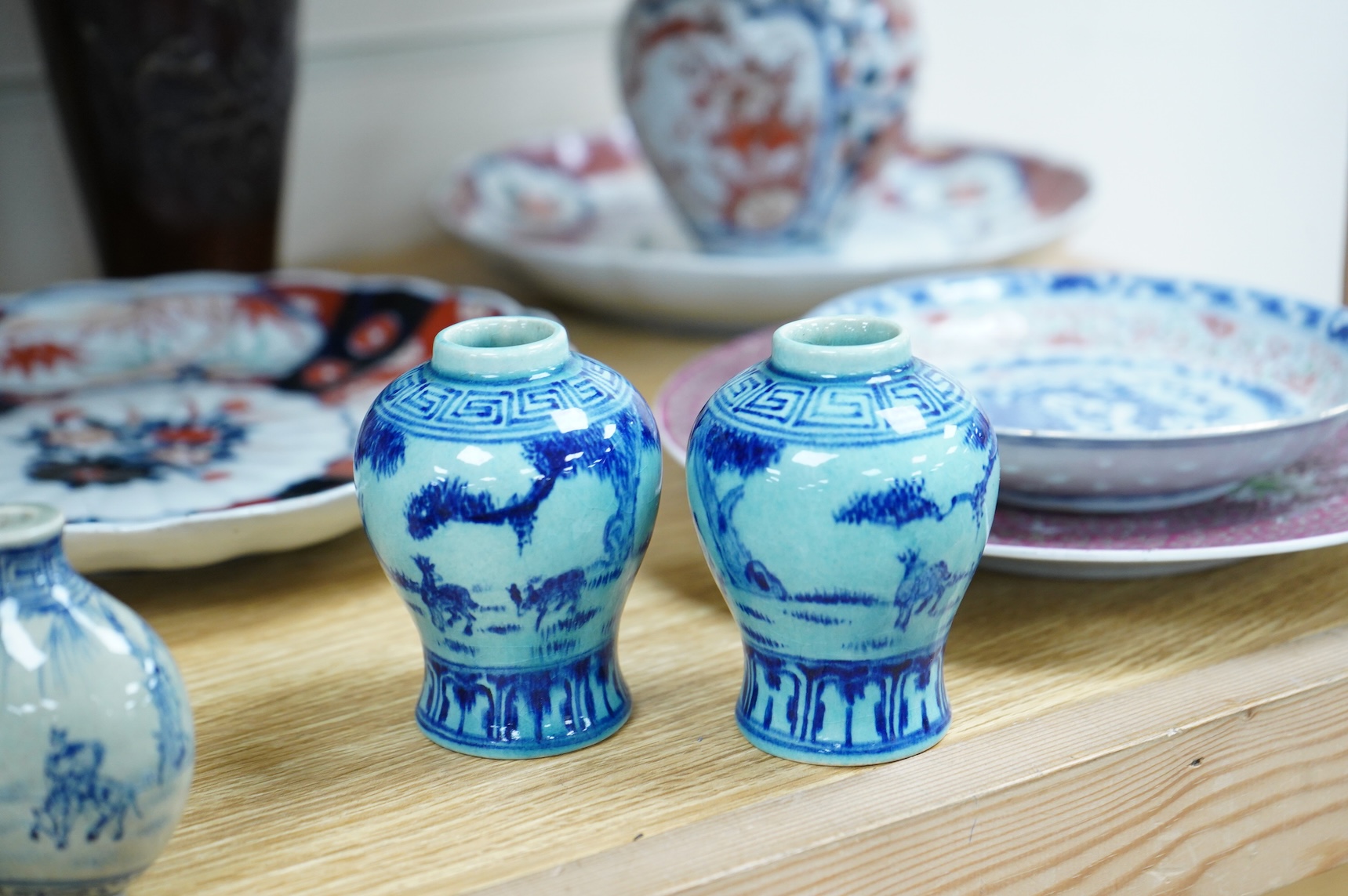 A collection of Asian ceramics to include an inside painted glass snuff bottle, pink ground dish and an Imari dish